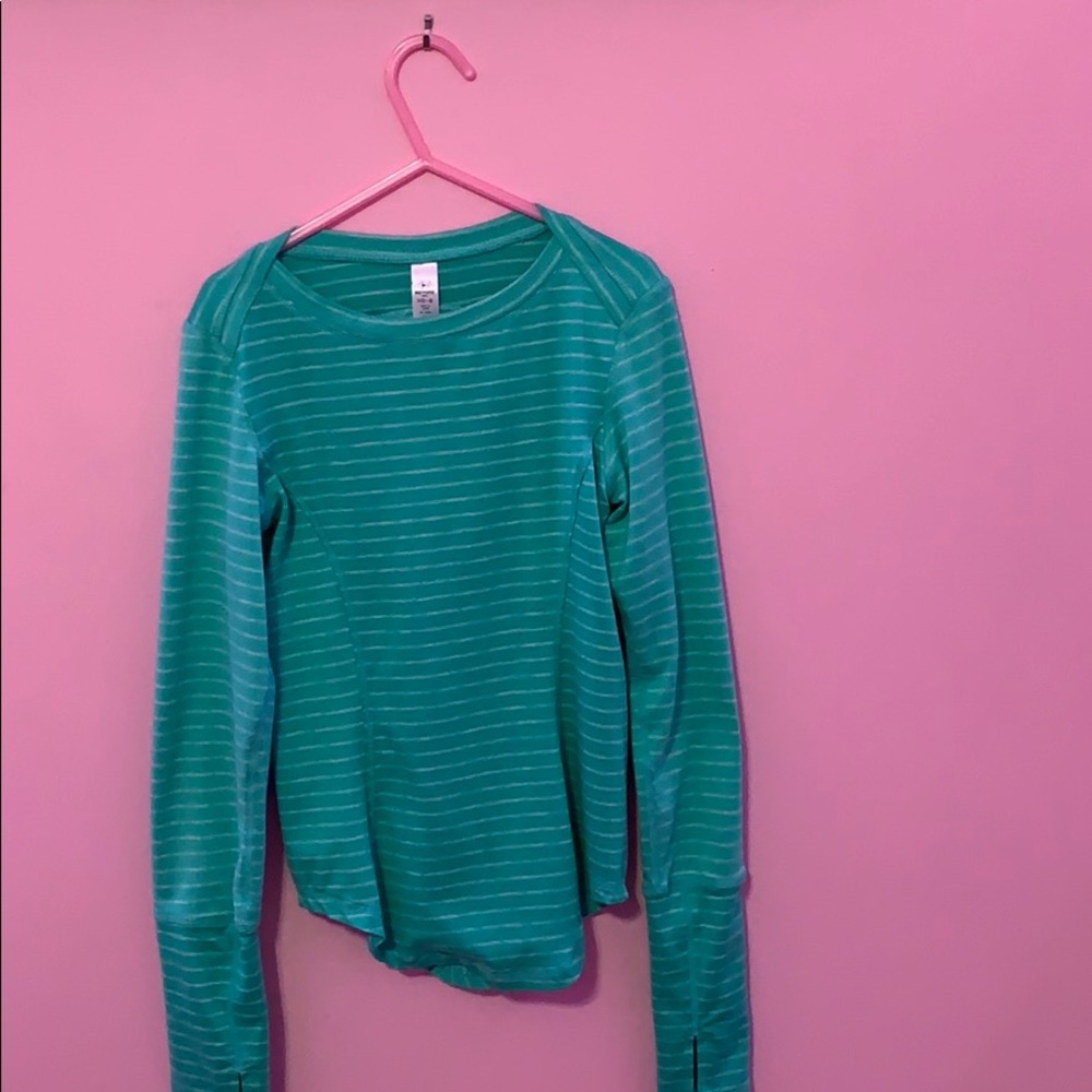 A striped teal and white long sleeve shirt